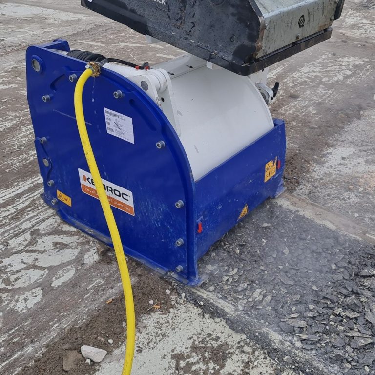 KEMROC EX asphalt patch planer accurately cuts narrow trench through road surface with water dust-suppression for cable laying