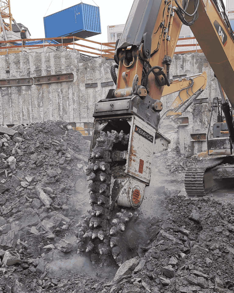 EK 150 chain cutter attachment for 35–50 ton excavators. Delivers up to 40% energy savings, narrow trench profiles, and reusable fine-grained spoil in rock and concrete up to 120 MPa UCS.