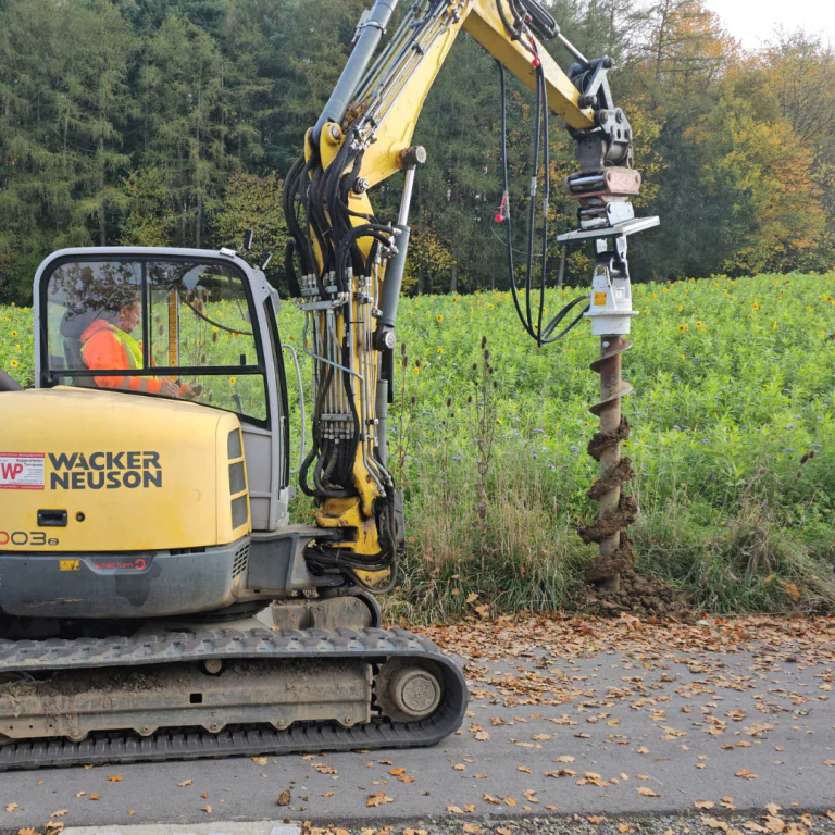 EBA Auger Drives in Tree Planting Holes Application