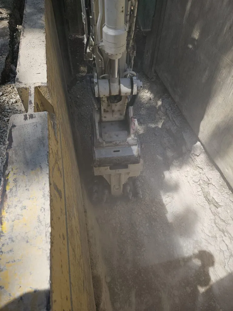 Trenching in Hard Limestone Rock by KEMROC KR 150 Drum Cutter